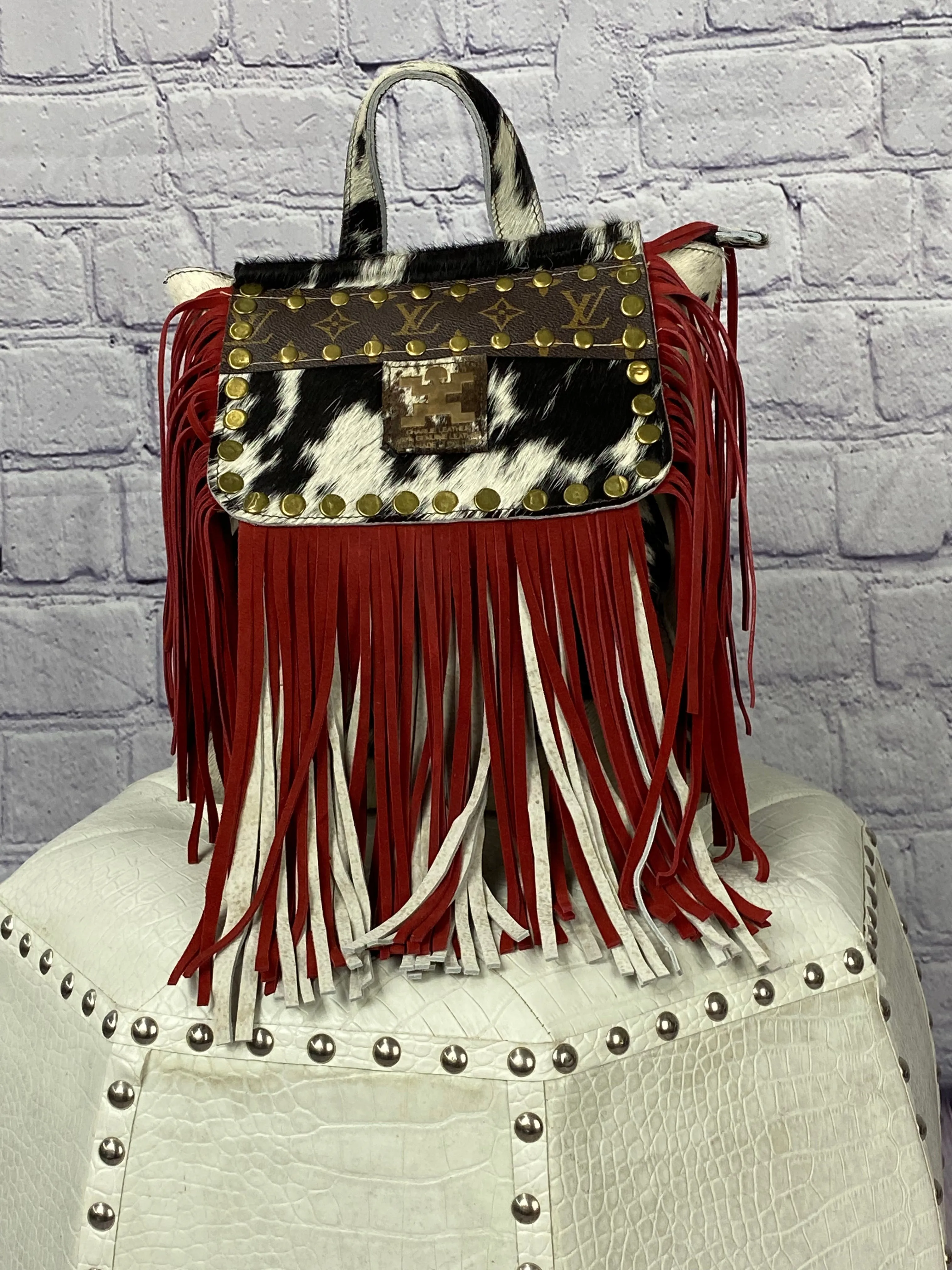 Repurposed LV White Cowhide Charlie Leather Backpack