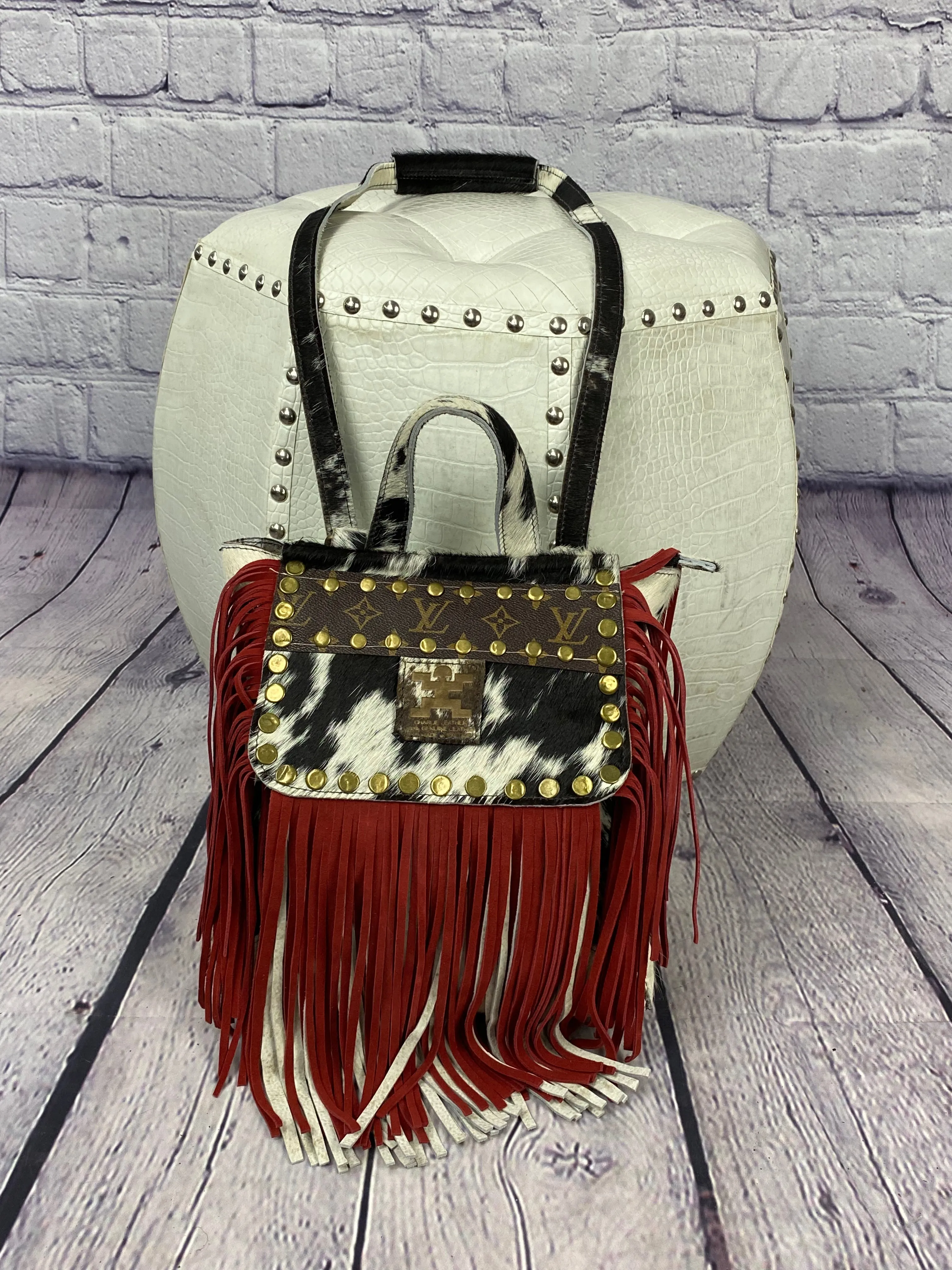 Repurposed LV White Cowhide Charlie Leather Backpack